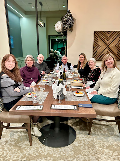 A wonderful evening spent with friends around a dinner table.