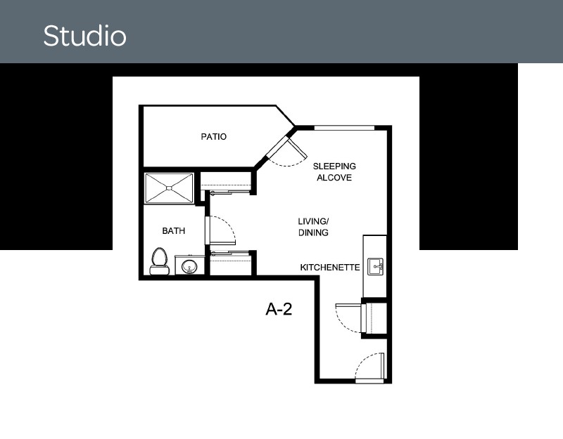 Studio apartment floor plan with kitchen, living space, and bathroom.