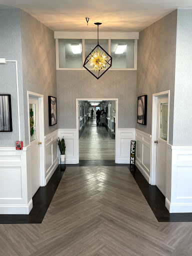 A contemporary hallway featuring elegant lighting and stylish decor.