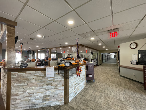 A welcoming reception area featuring modern decor and a spacious layout.