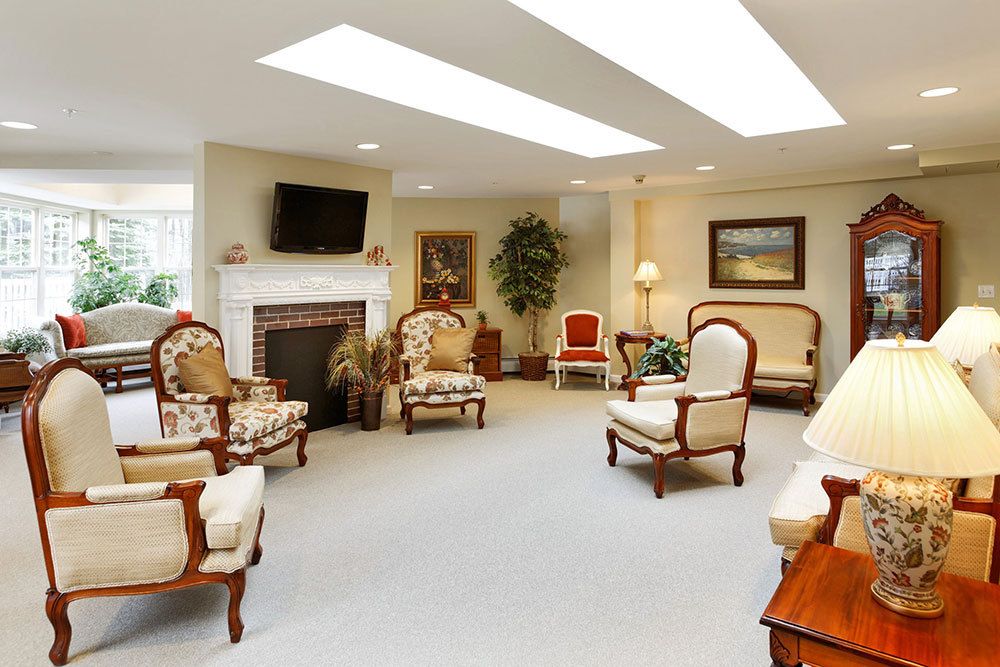 A cozy living room with elegant furniture and a fireplace.