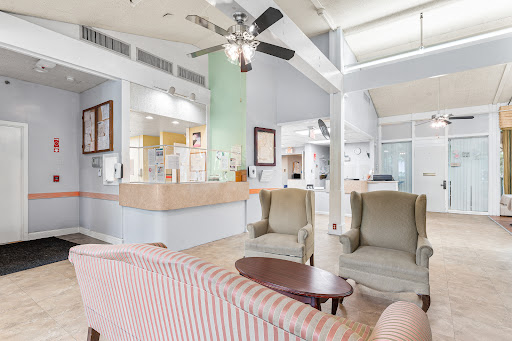 A welcoming lobby area with comfortable seating and a reception desk.