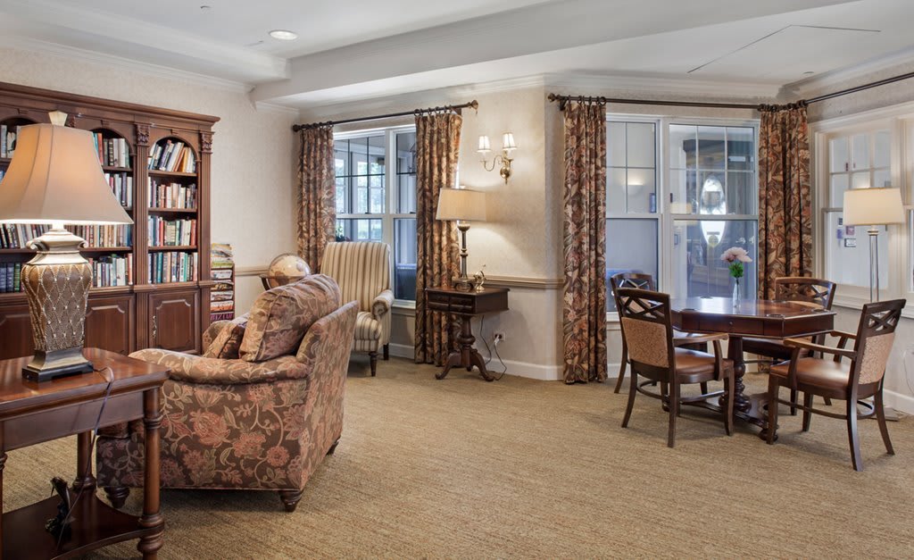 A cozy living room with classic furniture and a warm atmosphere.