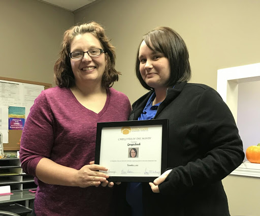 Celebrating success with a certificate of achievement.