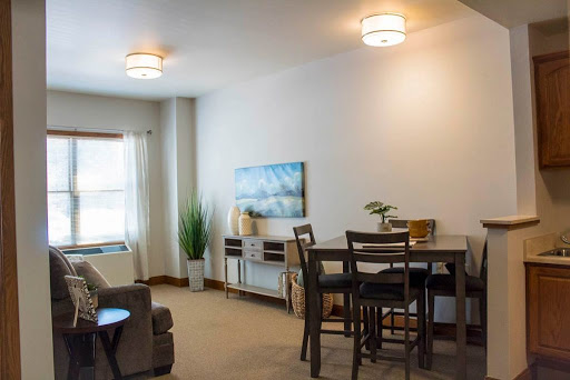 A cozy and modern living space featuring a dining area and stylish decor.