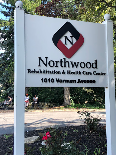 Sign for Northwood Rehabilitation & Health Care Center located on Varnum Avenue.