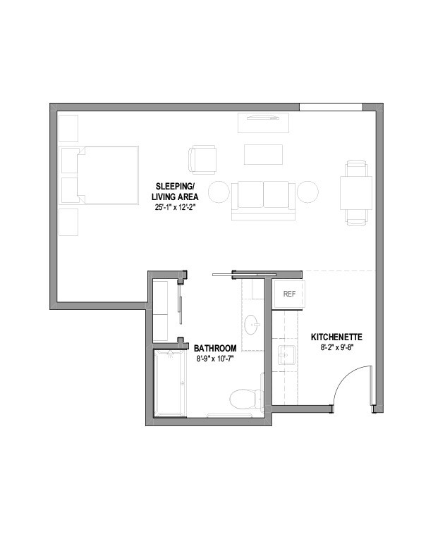 A floor plan of a studio apartment showing sleeping and kitchen areas.