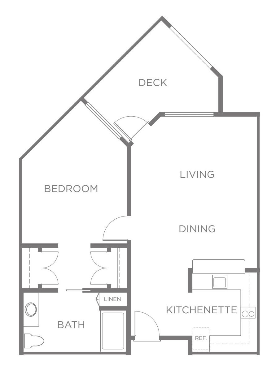 A floor plan showing the layout of a one-bedroom apartment with a deck, living area, dining space, kitchenette, and bathroom.