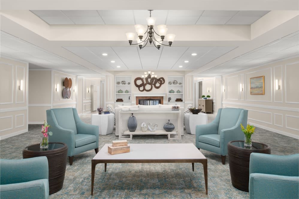 A modern living room with stylish armchairs and elegant decor.