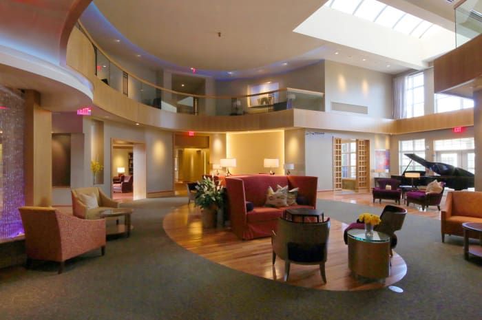 A modern lobby with elegant furniture and well-lit interior.