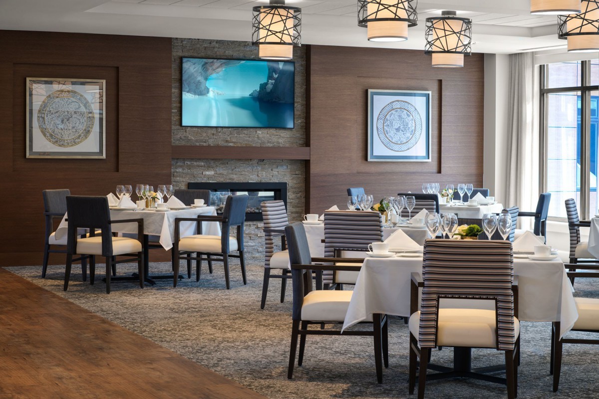 Elegant dining area in a restaurant with well-arranged tables and stylish decor.
