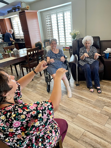 Engaging seniors in a joyful activity session at a community center.