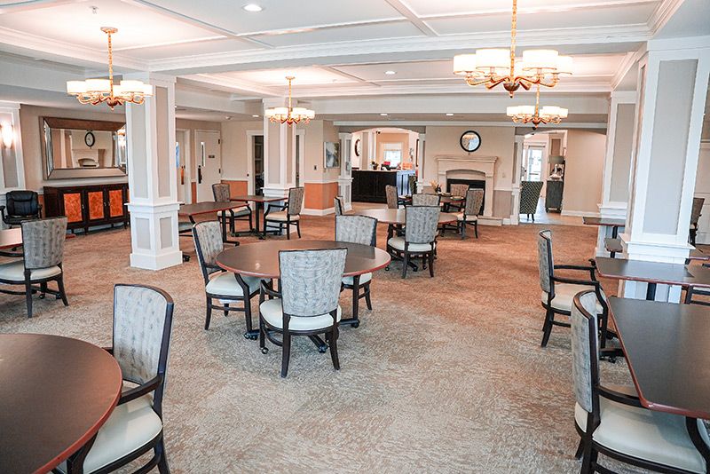 A spacious and cozy dining area with elegant decor and ample seating.