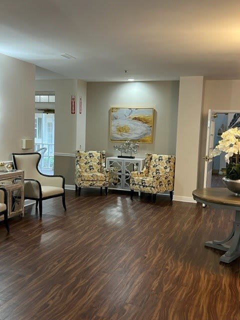 Elegant lobby seating area with stylish decor and artwork.