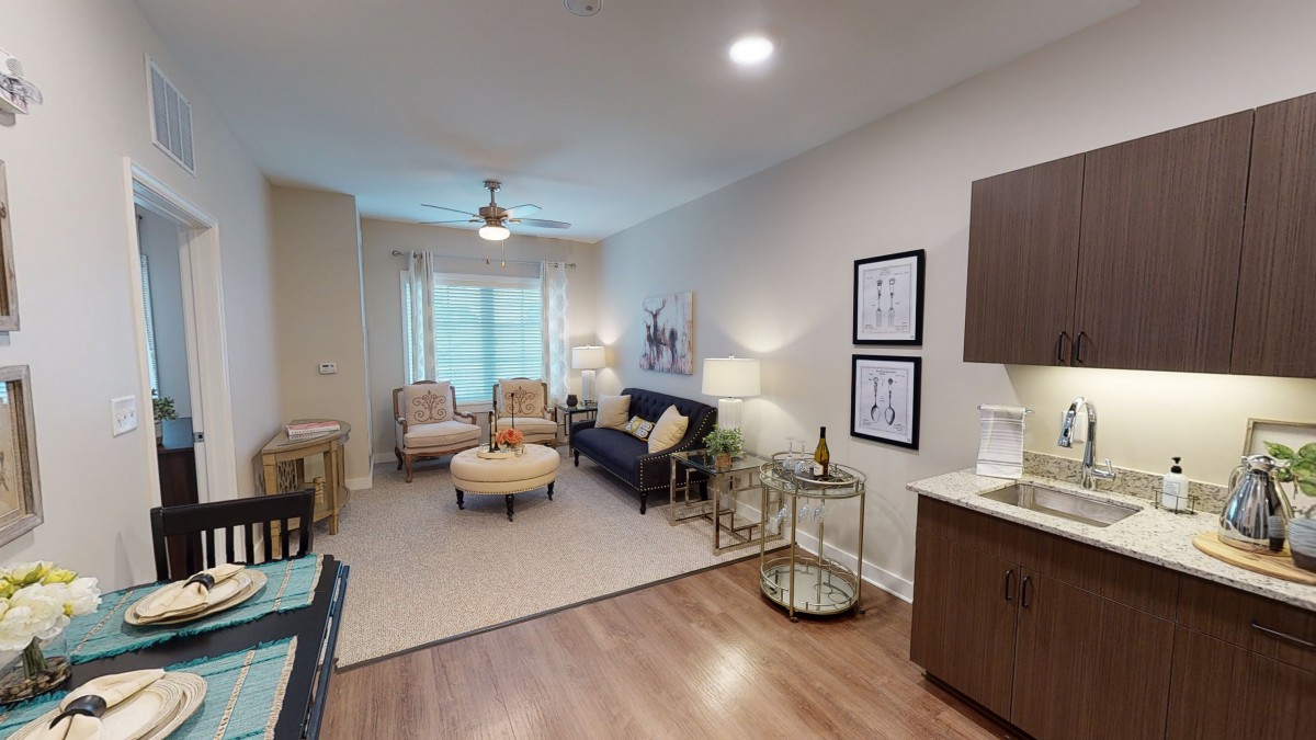 A modern and cozy living room with stylish furniture and decor.