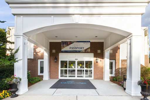 The entrance to a welcoming building featuring a prominent sign.