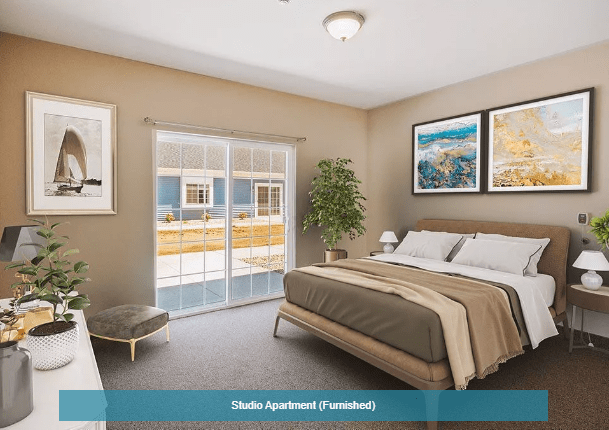 A cozy studio apartment bedroom with modern decor.
