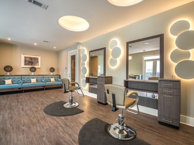 Modern salon interior with stylish design and comfortable seating.