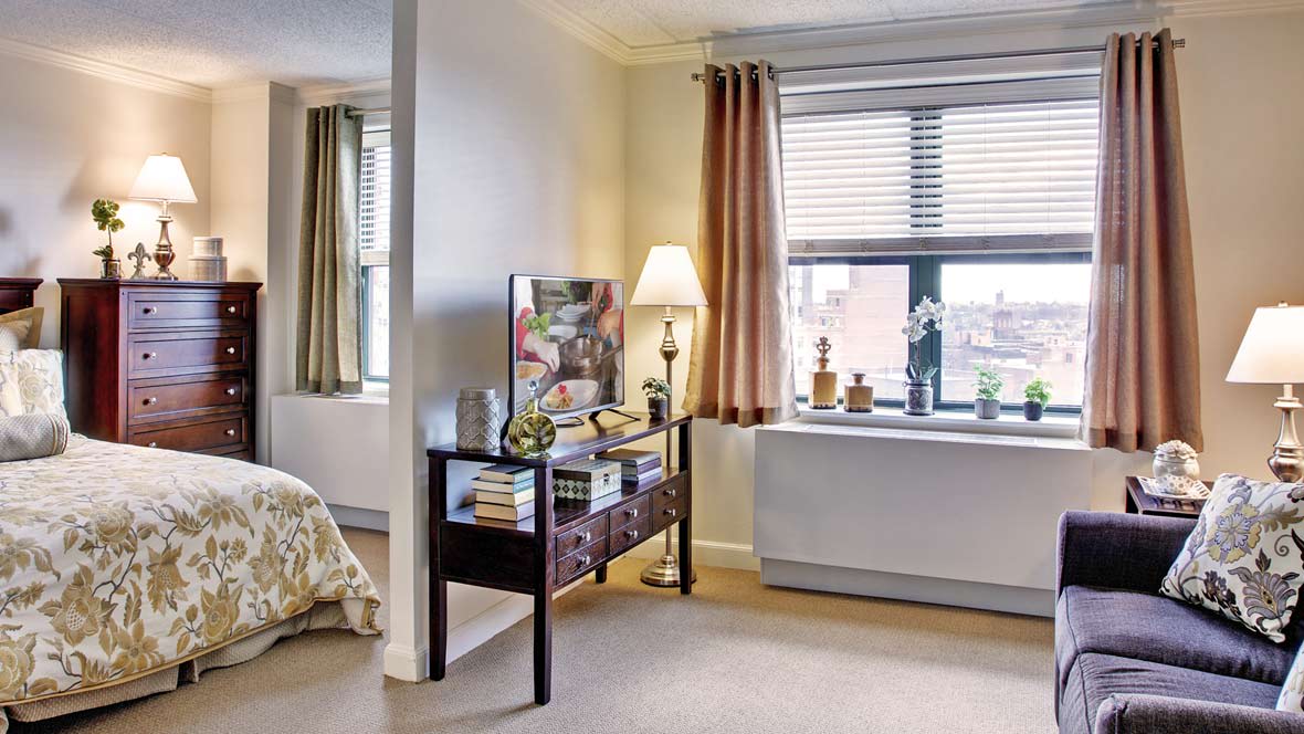 A cozy, modern living space with natural light streaming through the windows.