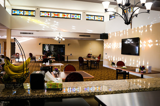 A cozy restaurant interior featuring elegant lighting and a welcoming dining atmosphere.