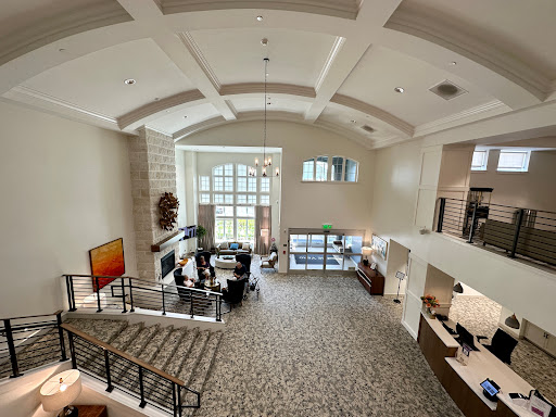 A spacious and modern lobby with elegant furnishings and abundant natural light.