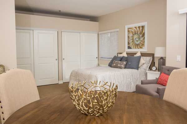 A modern and cozy bedroom interior with stylish decor.