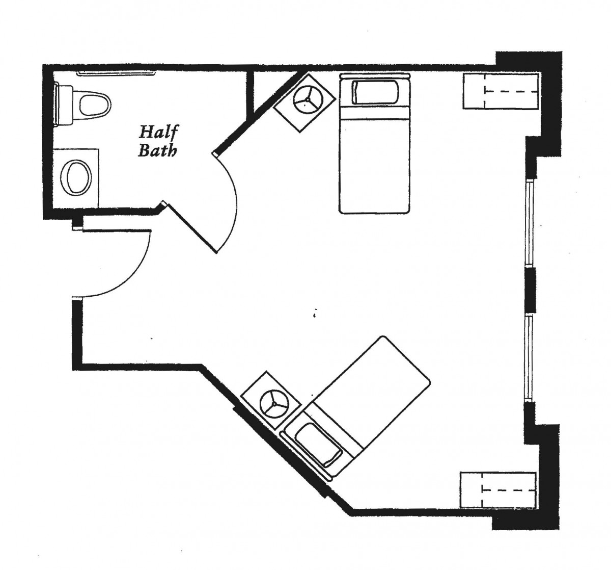 An architectural floor plan of a room featuring two beds, a bathroom, and a small entryway.