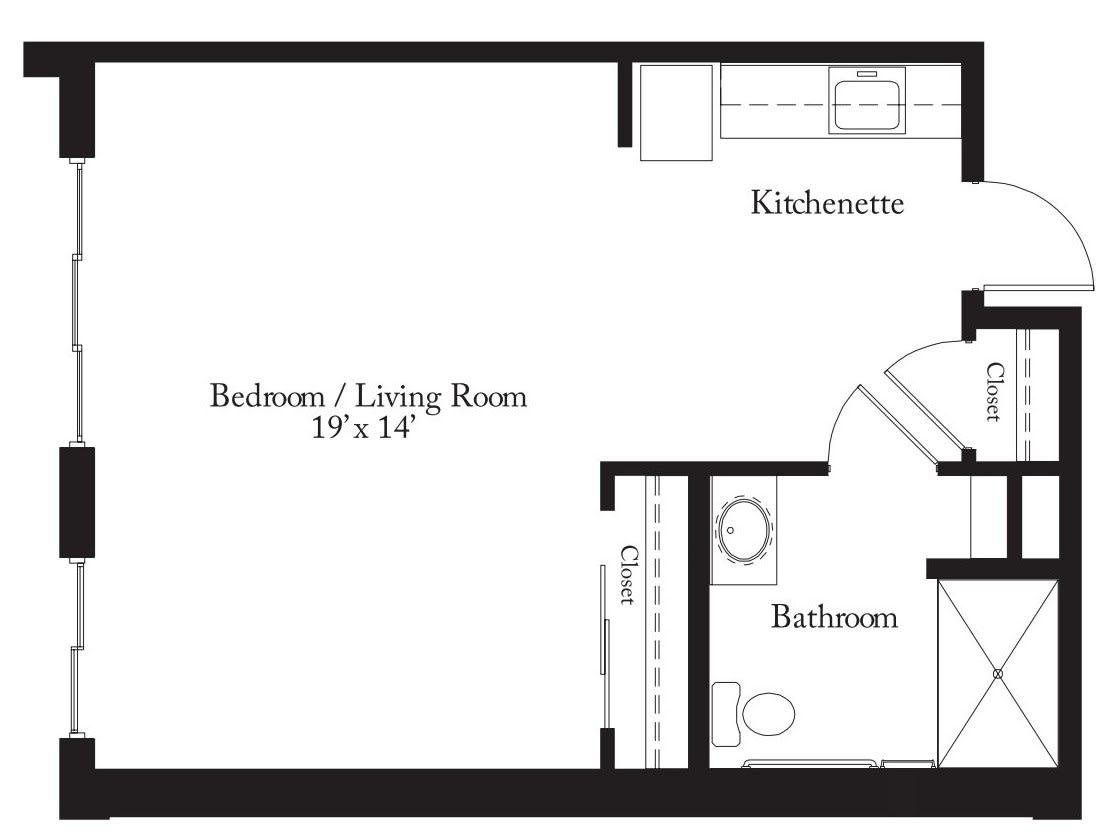 Floor plan of a studio apartment featuring a combined bedroom and living room, kitchen, and bathroom.