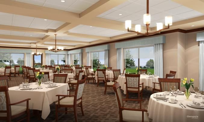 A spacious and elegantly designed restaurant dining area with large windows and neatly arranged tables.