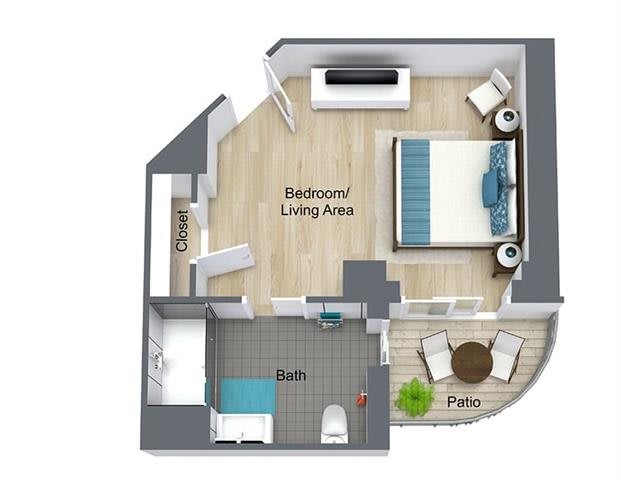 A digital floor plan of a studio apartment featuring a combined bedroom and living area, a bathroom, and a small patio.