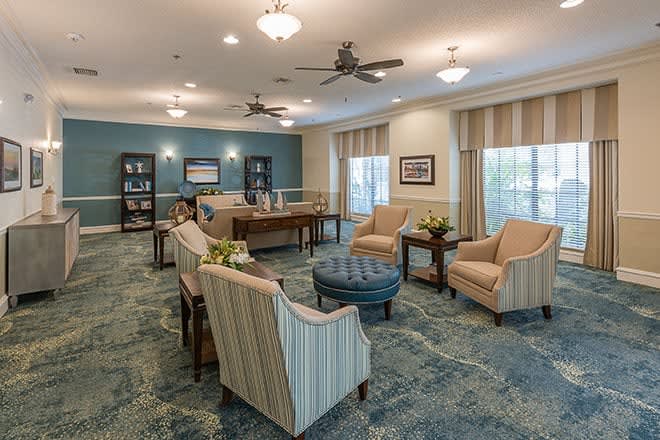 A cozy living room with comfortable seating and elegant decor.