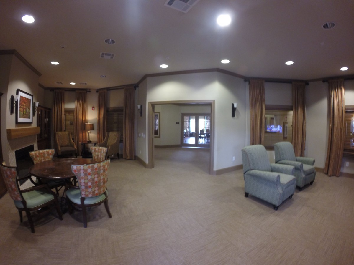 A cozy lobby interior with comfortable seating and soft lighting.