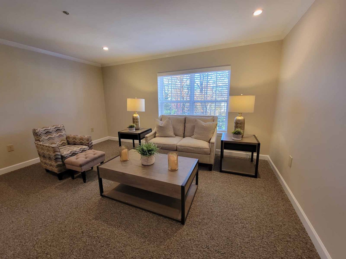 A cozy living room with stylish furniture and soft lighting.