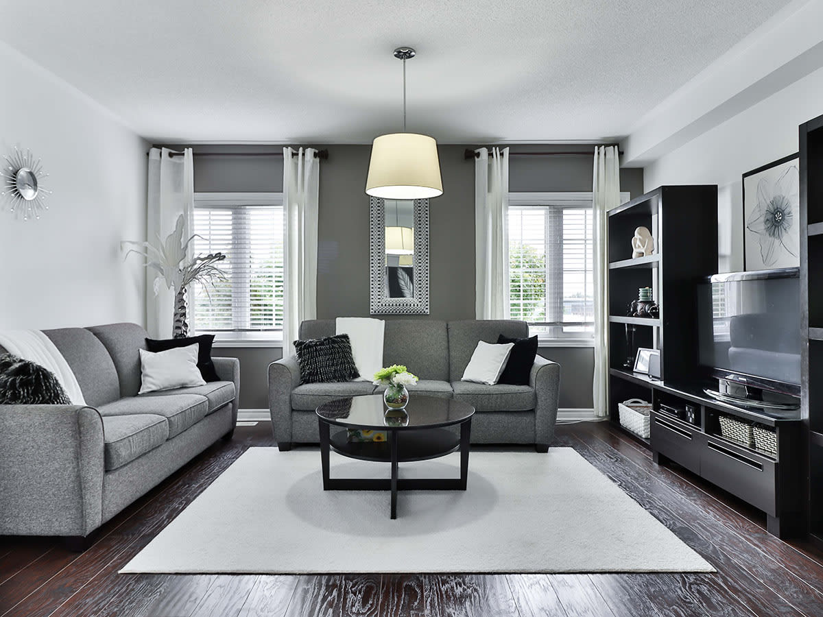 A modern living room with stylish furniture and decor.