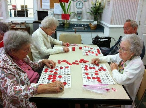 Seniors enjoying a lively game of bingo at the community center.
