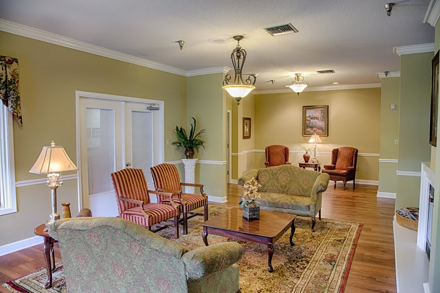 A cozy lounge area with elegant furnishings and a warm ambiance.
