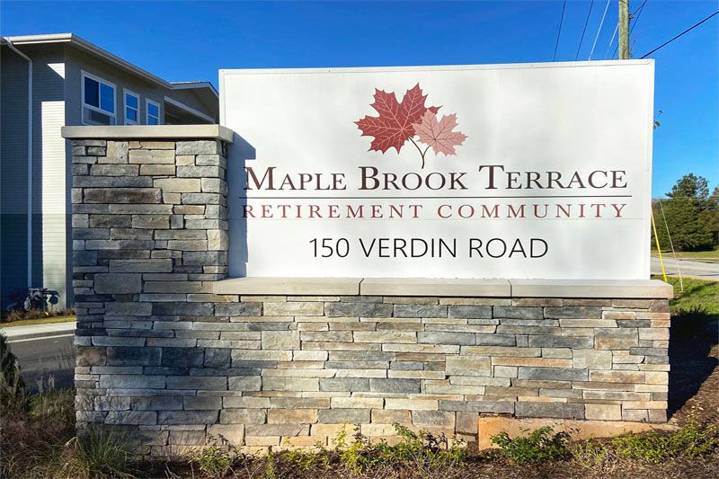 Sign for Maple Brook Terrace Retirement Community at 150 Verdin Road.