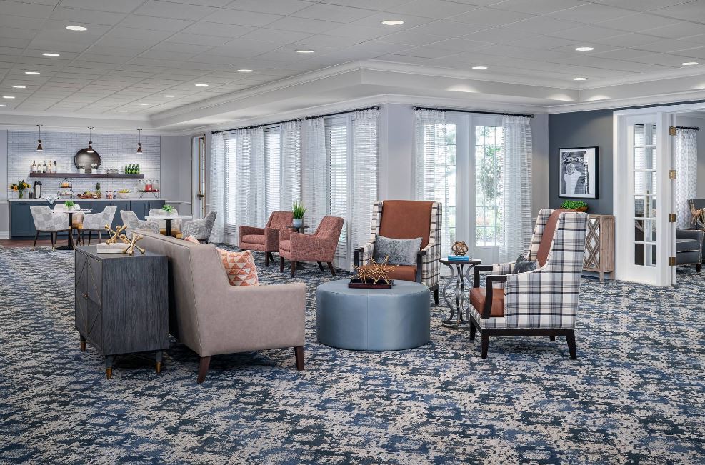 A modern lobby with comfortable seating and stylish decor.