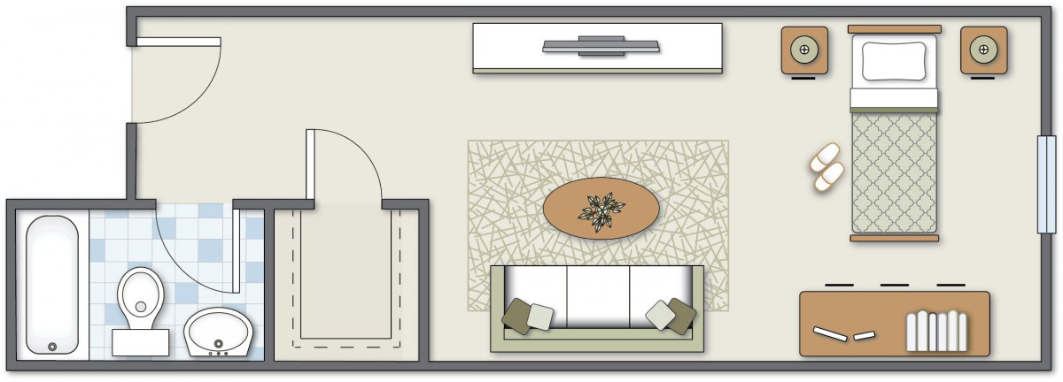 A floor plan of a living room with a sofa, coffee table, and a rug.