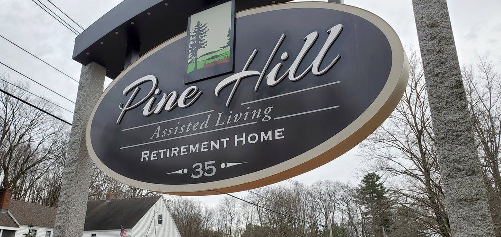 Sign for Pine Hill Assisted Living and Retirement Home.