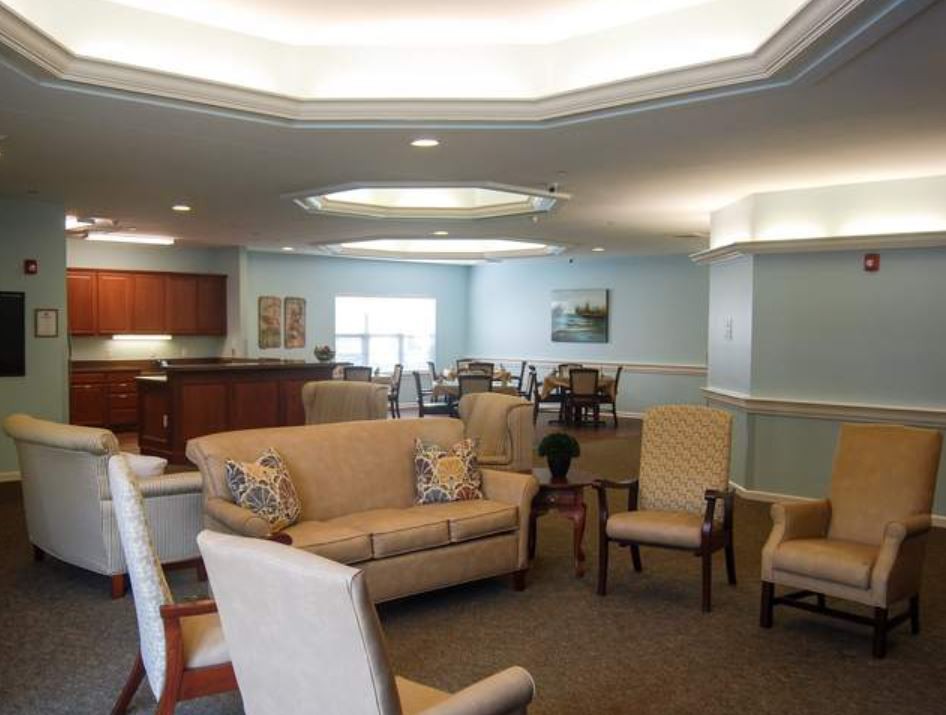 A cozy living room with comfortable seating and subtle decor.