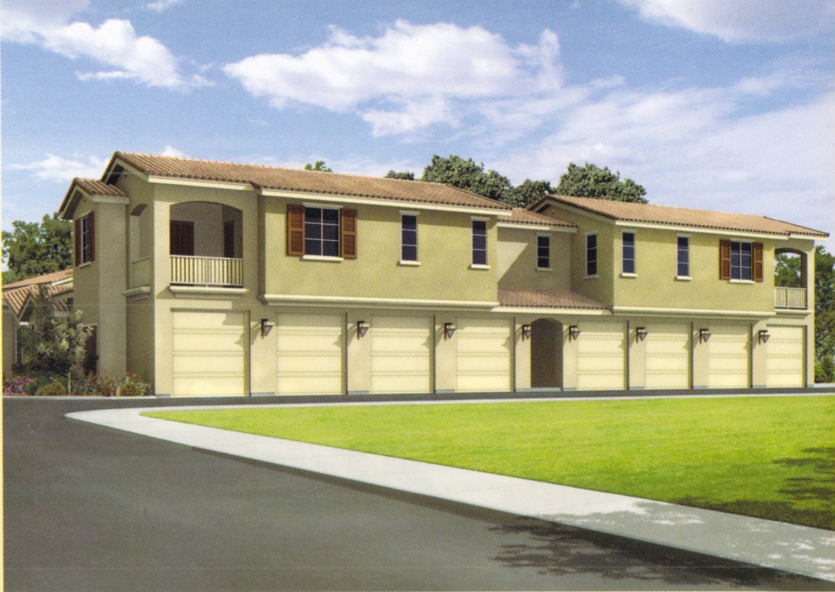 A suburban townhouse complex with multiple attached garages and modern architectural design.