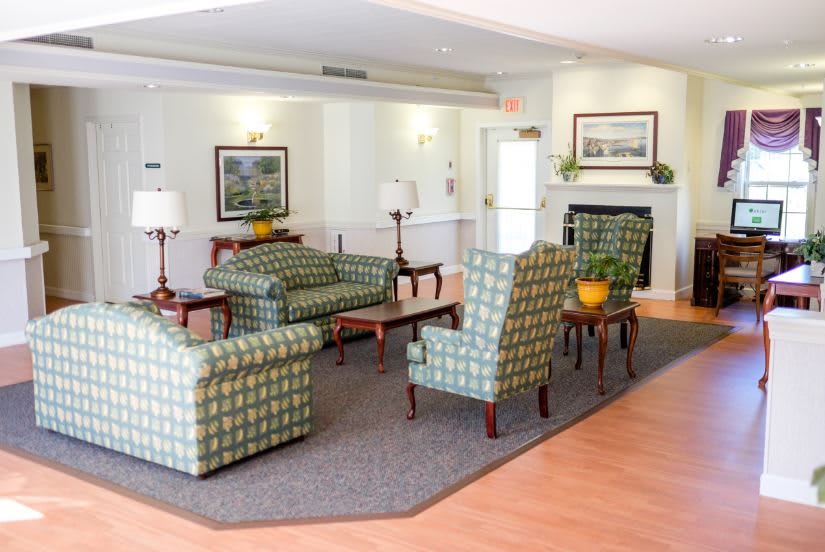 A cozy living room with comfortable seating and elegant decor.