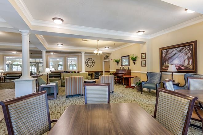 A cozy living room with comfortable seating and elegant decor.