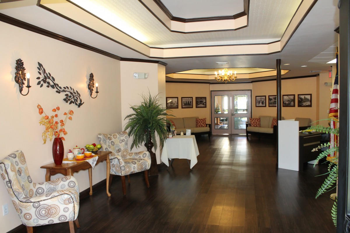 A well-decorated lobby with comfortable seating and soft lighting.