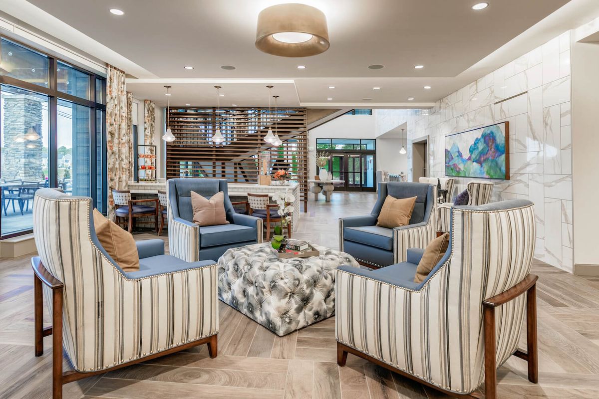 A modern and cozy living room with comfortable seating and stylish decor.