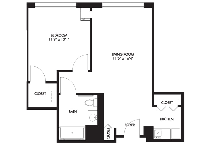A floor plan of a one-bedroom apartment featuring a living/dining area, kitchen, bathroom, and closets.