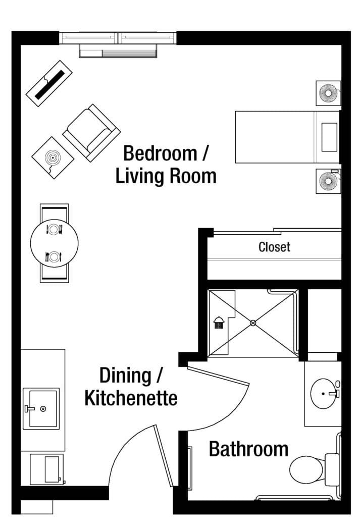 A floor plan of a studio apartment showing the layout of a bedroom/living room and dining/kitchenette area.