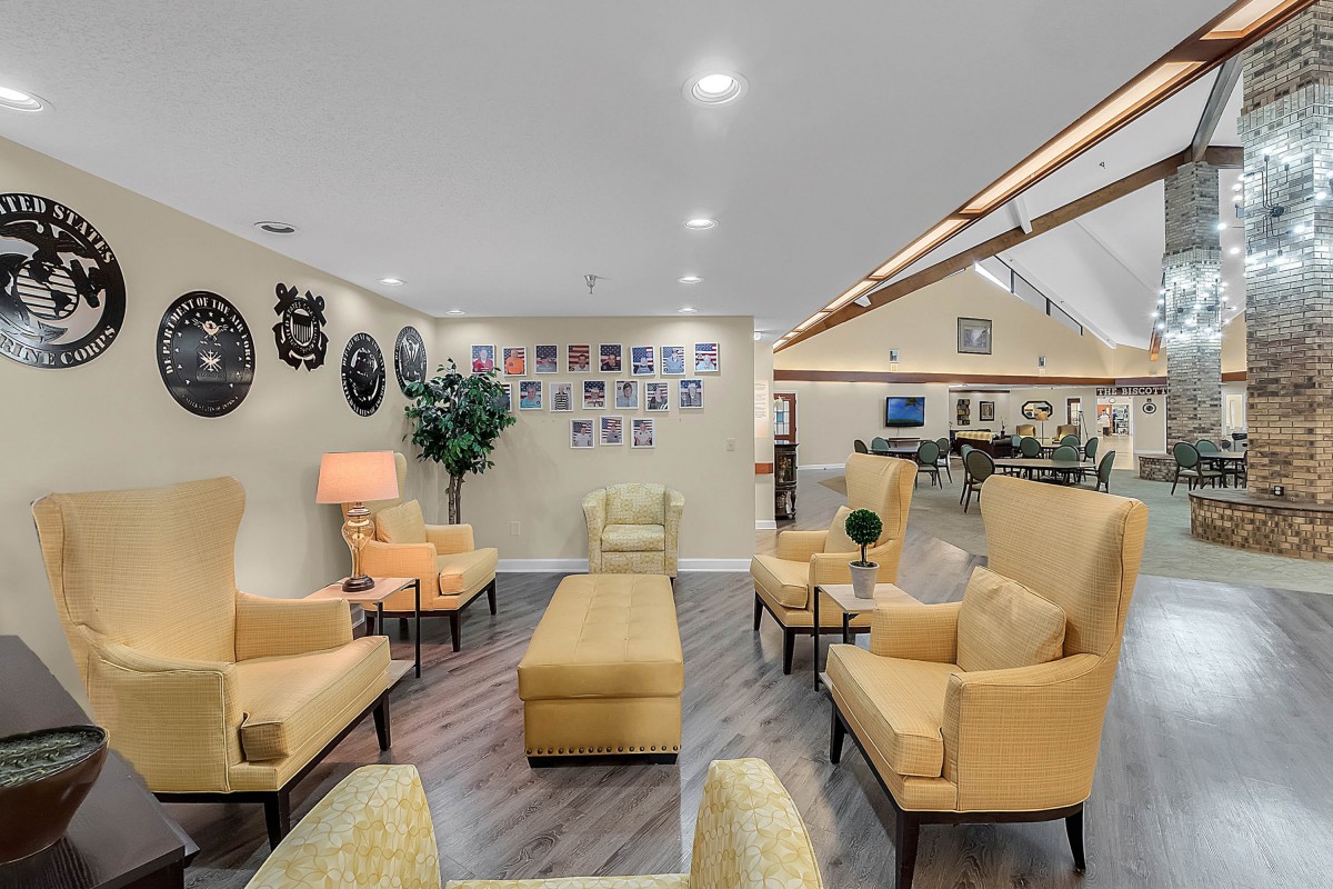 A cozy lounge area with comfortable yellow chairs and stylish decor.