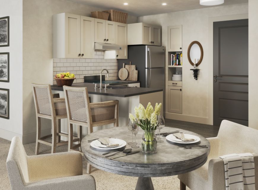 A modern kitchen with a dining area featuring stylish decor and stainless steel appliances.